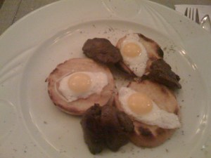 Chicken liver and quail eggs on toast
